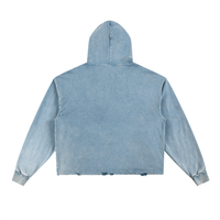 Light blue denim hoodie with a distressed hem, viewed from the back. The hoodie features long sleeves and a relaxed fit.